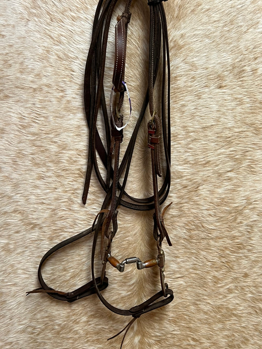 Used One Ear Bridle With Split Reins and Argentine Engraved Square Port Correctional Bit with Copper Rollers